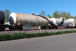 Tarp caught on tank cars